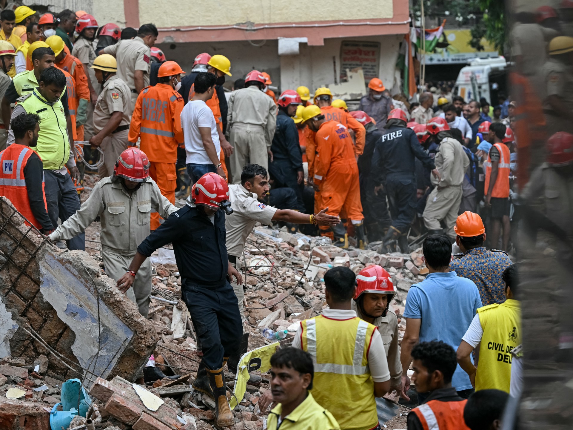 Rescue teams search Delhi rubble after building collapse kills six