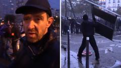 Paris protests escalate into clashes as night falls over French capital