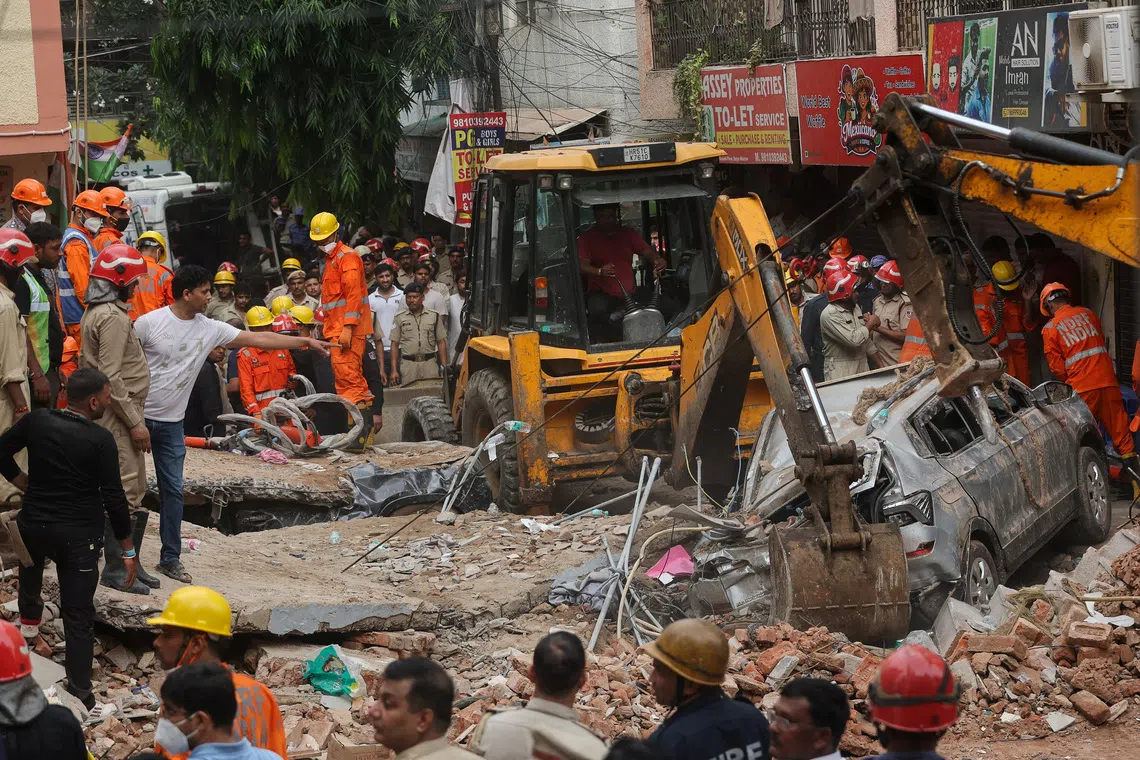 Six dead in Delhi building collapse as rescue efforts continue