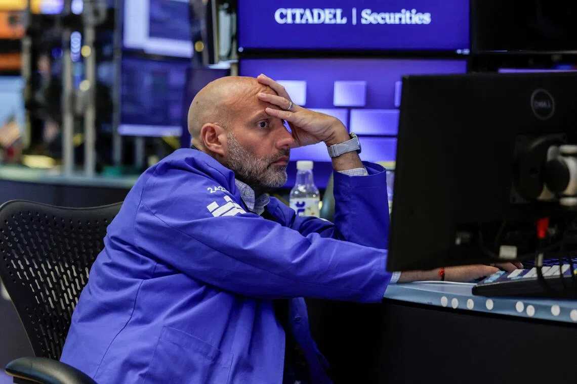 Wall Street tumbles as bond yields surge, Walmart disappoints
