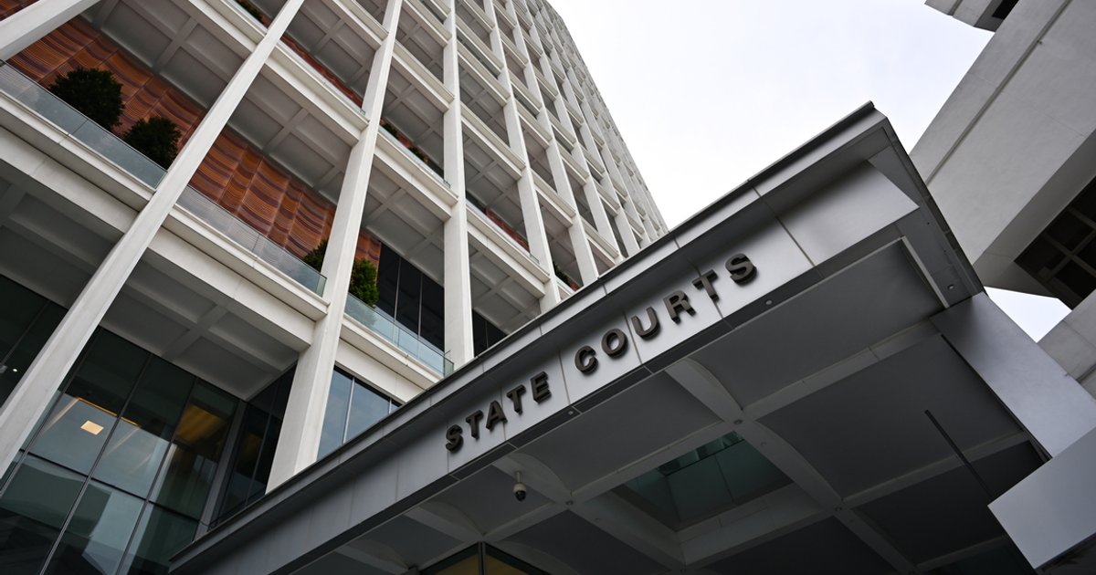 Two men to face charges in $23,000 scam targeting Singapore woman