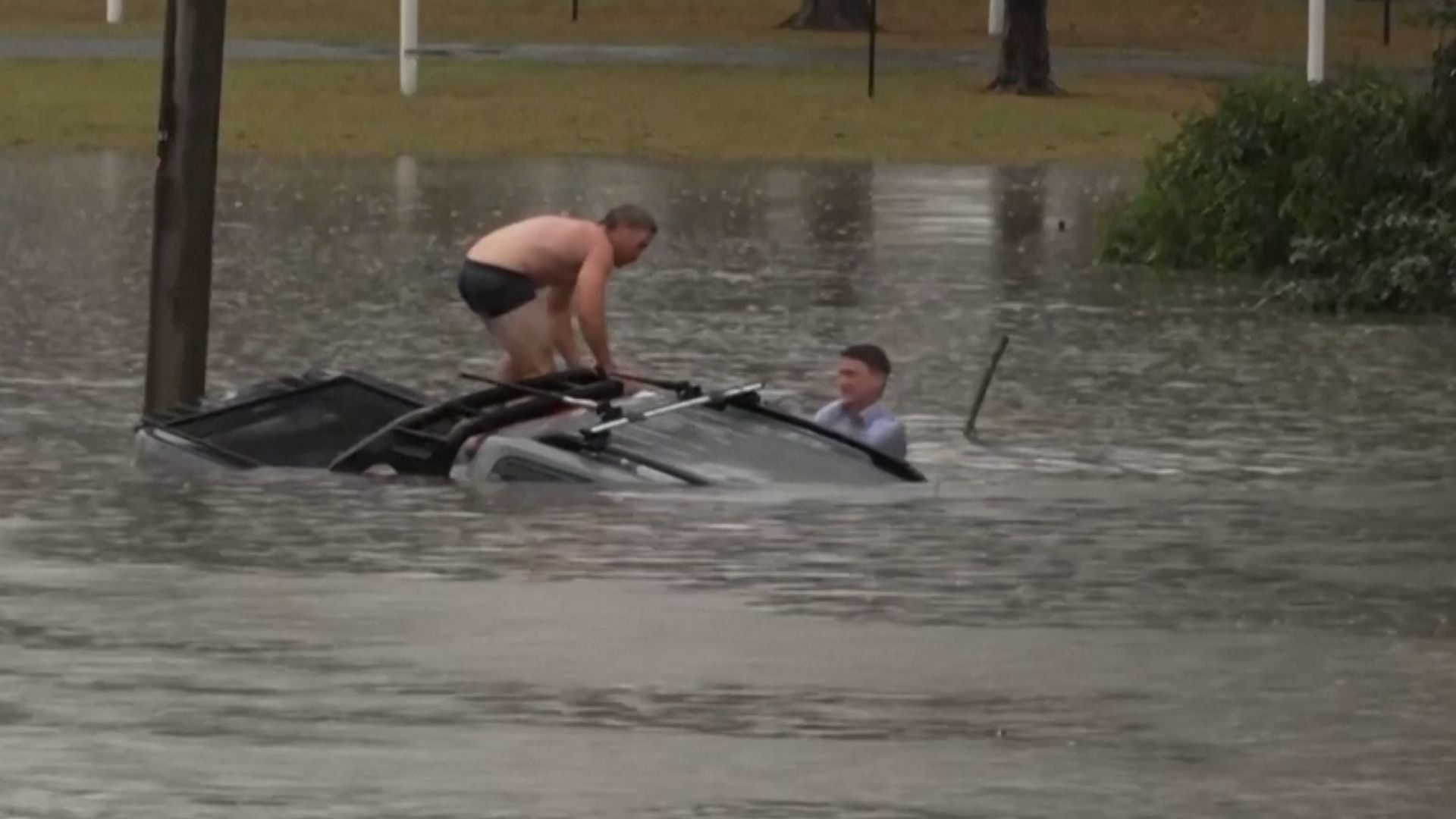 Australian Broadcaster Saves Driver From Submerged Vehicle
