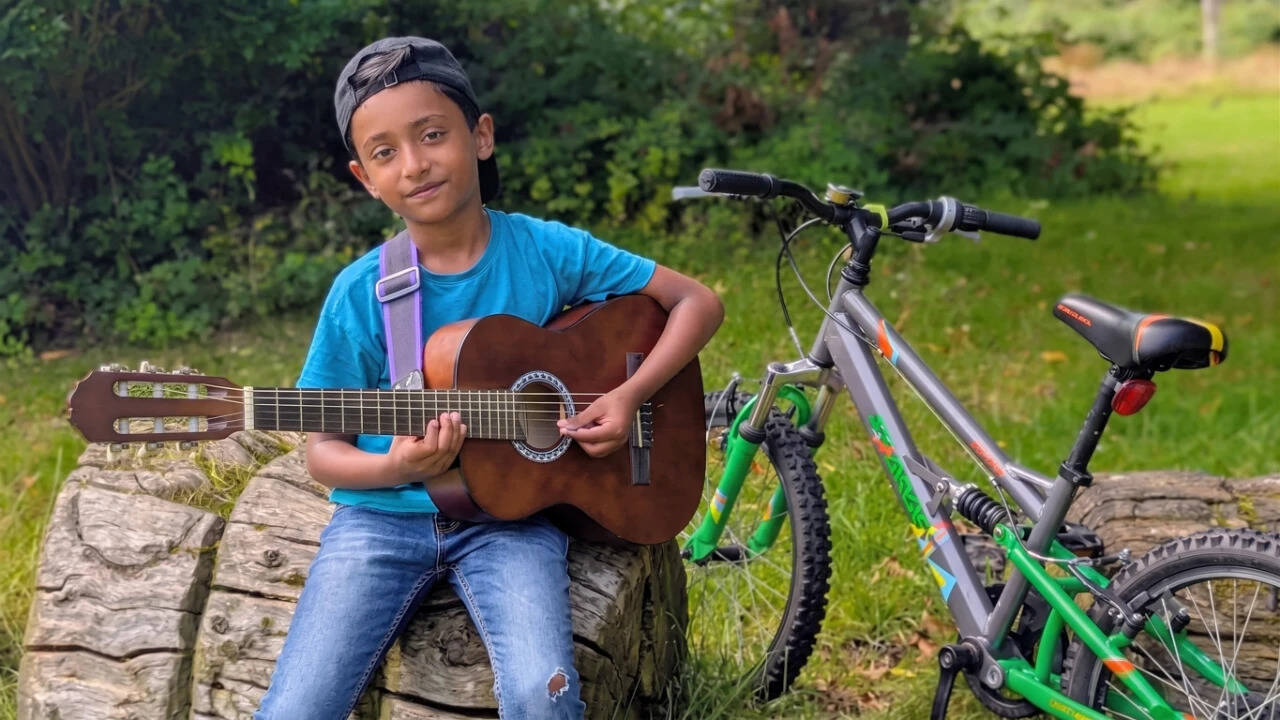 Nine-year-old Indian guitarist pursues Guinness record with Grade 8 exam