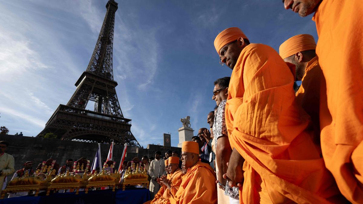 French outcry as Eiffel Tower removes female staff for religious delegation