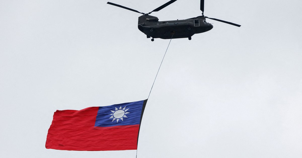 Taiwan flies massive flag from helicopter for national day celebrations