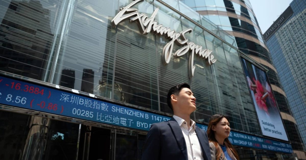 Hong Kong stocks slide as bond yields, oil prices surge