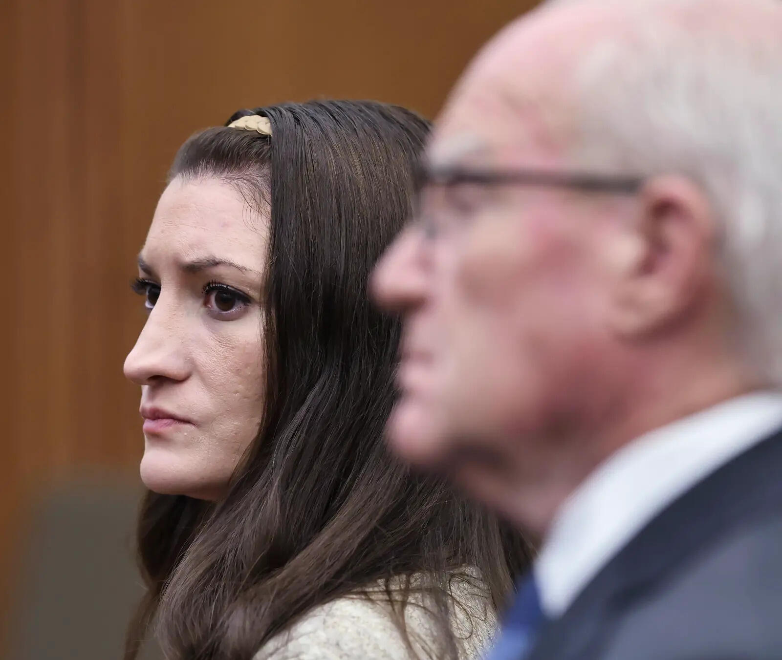 Woman arrested for allegedly recording jurors during murder trial