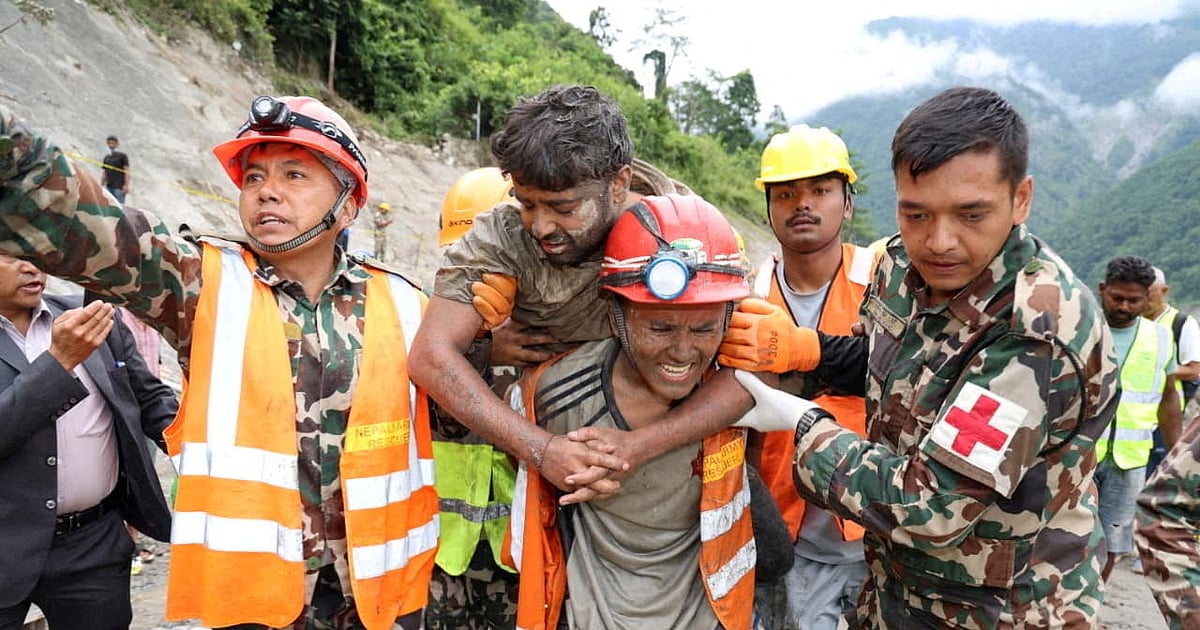 Two men survive nine days trapped in Nepal flood tunnel