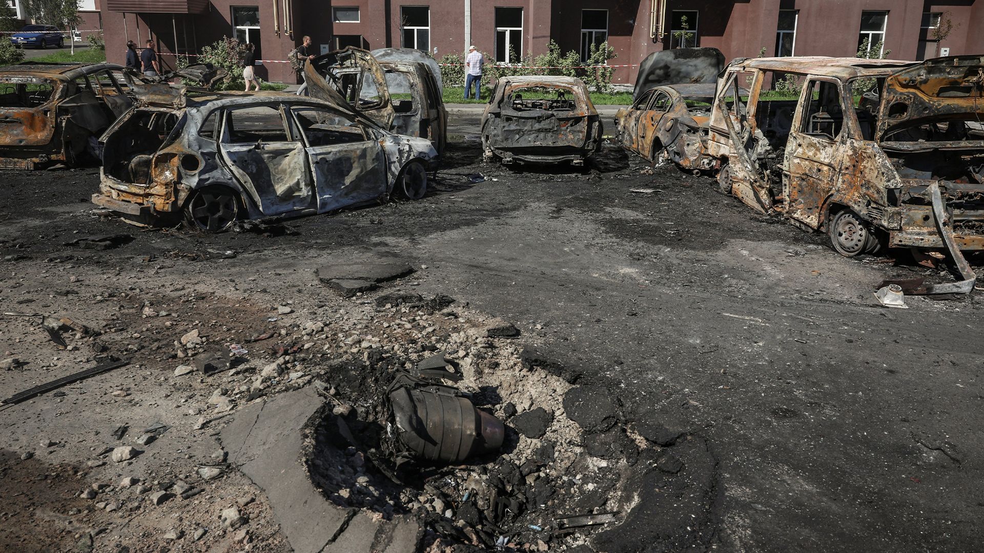 Woman narrowly escapes as Russian drone strike hits Kyiv parking area