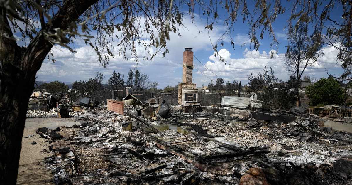 Firefighters contain massive blaze near Reno as thousands evacuate
