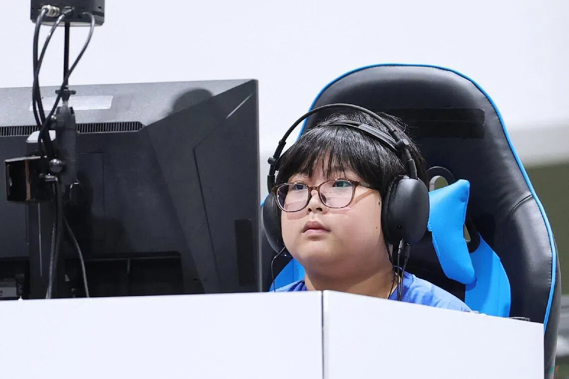 Japanese 11-year-old claims e-sports gold at Asian Games