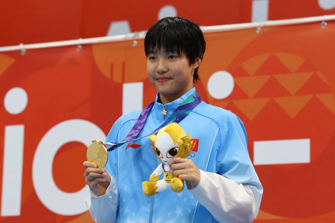 Teen swimming star propels China's Asian Games medal surge