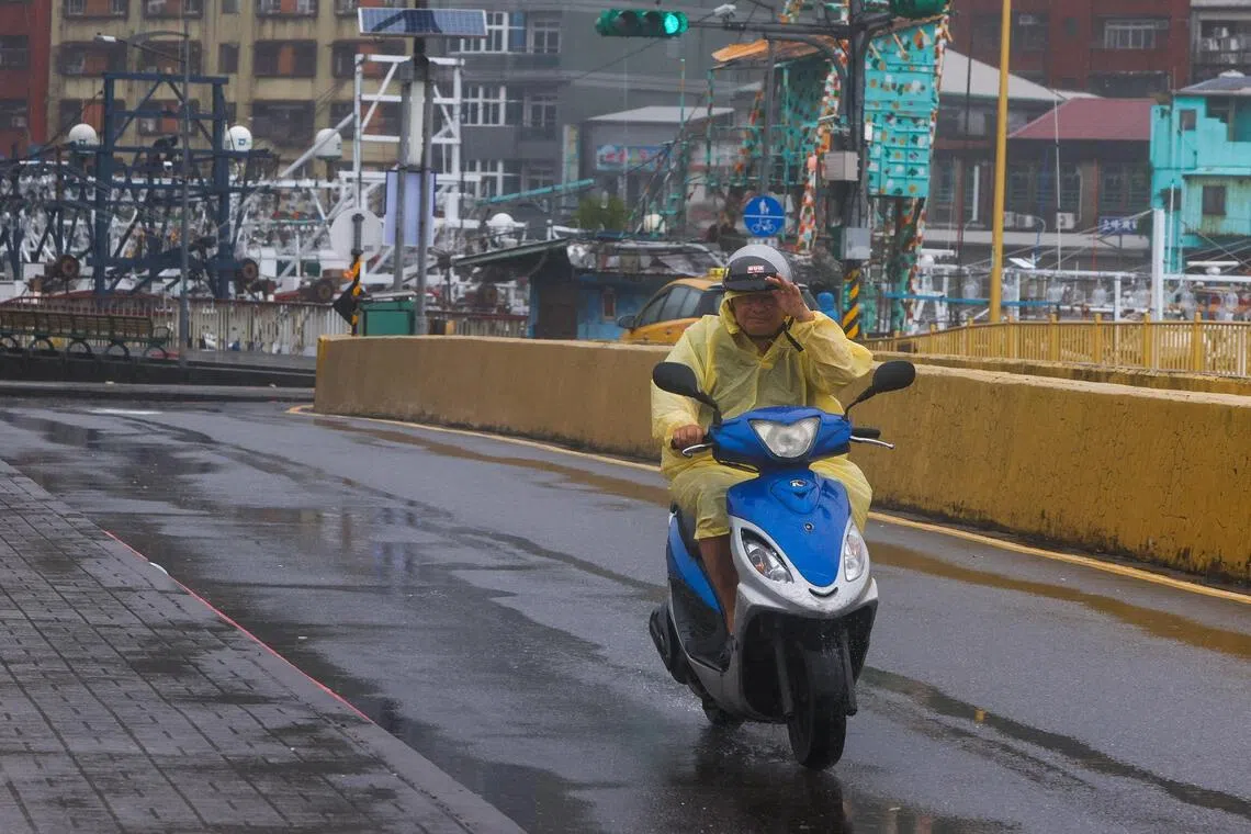 Taiwan's south shuts down as heavy rains trigger widespread flooding