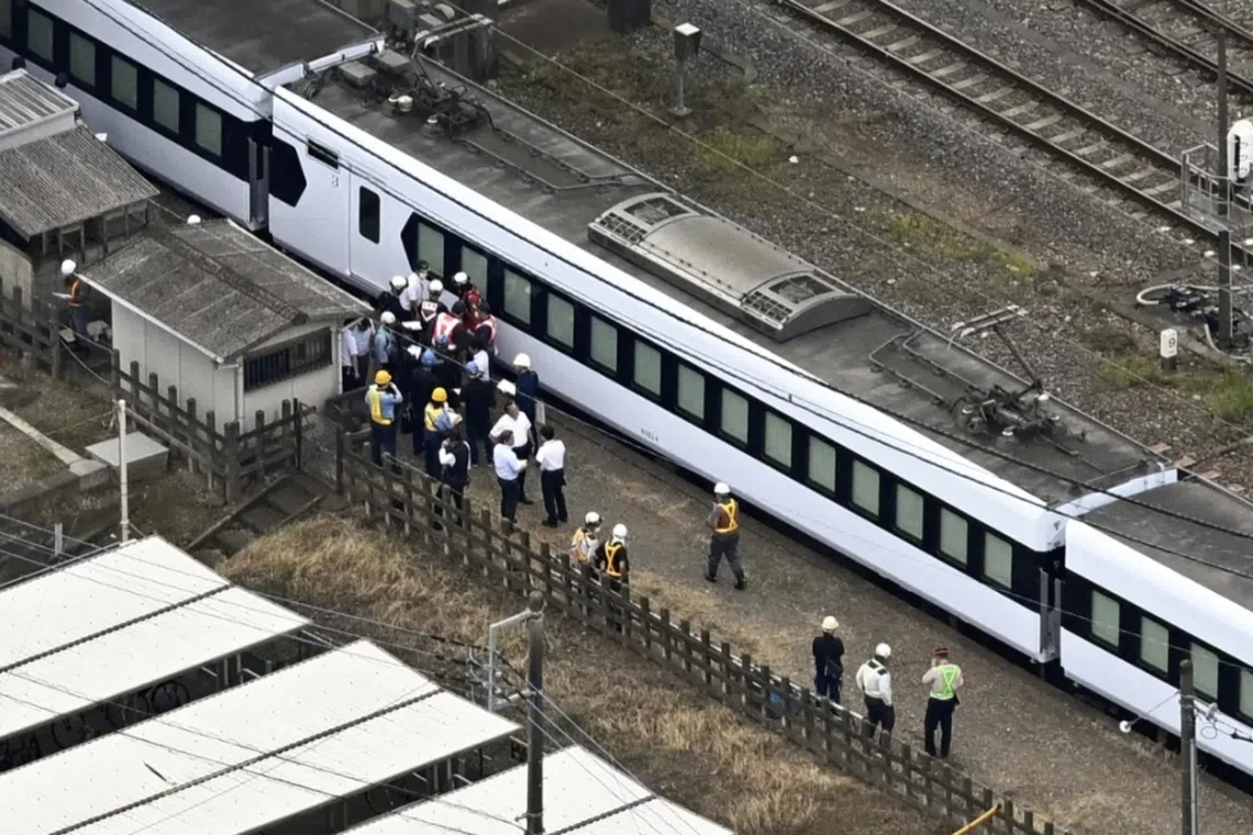 Four railway workers struck by train near Tokyo; three escape injury