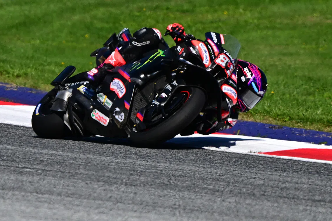 Martin claims pole position at Japanese MotoGP with track record lap