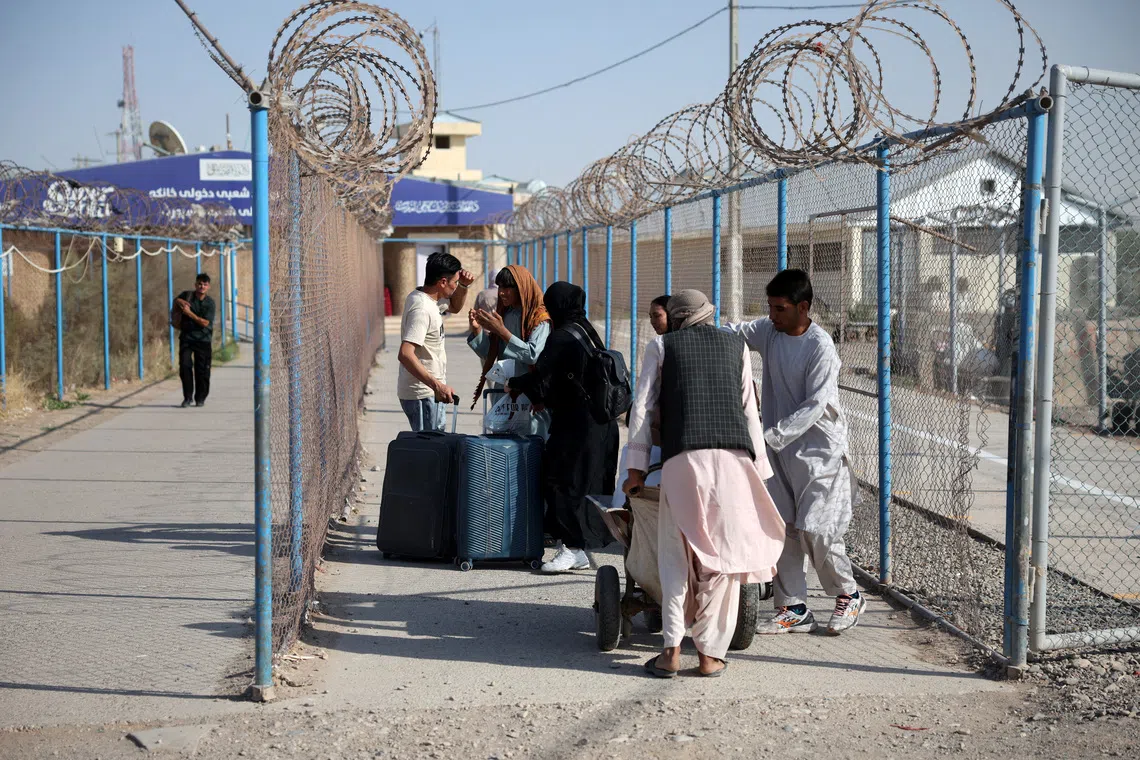 Afghan migrants return home from Iran as poverty deepens