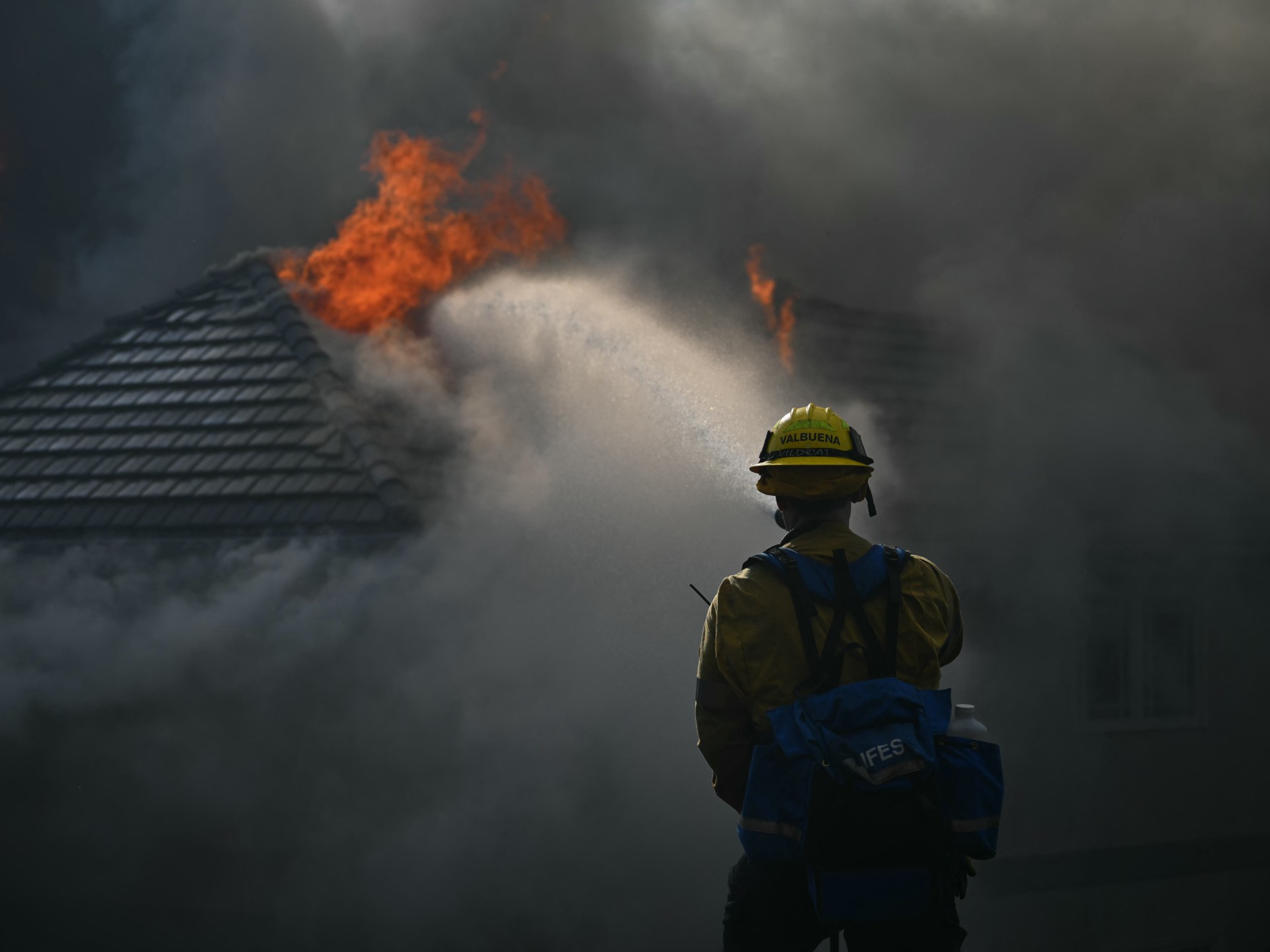 Fast-moving California wildfire forces mass evacuations in Orange County
