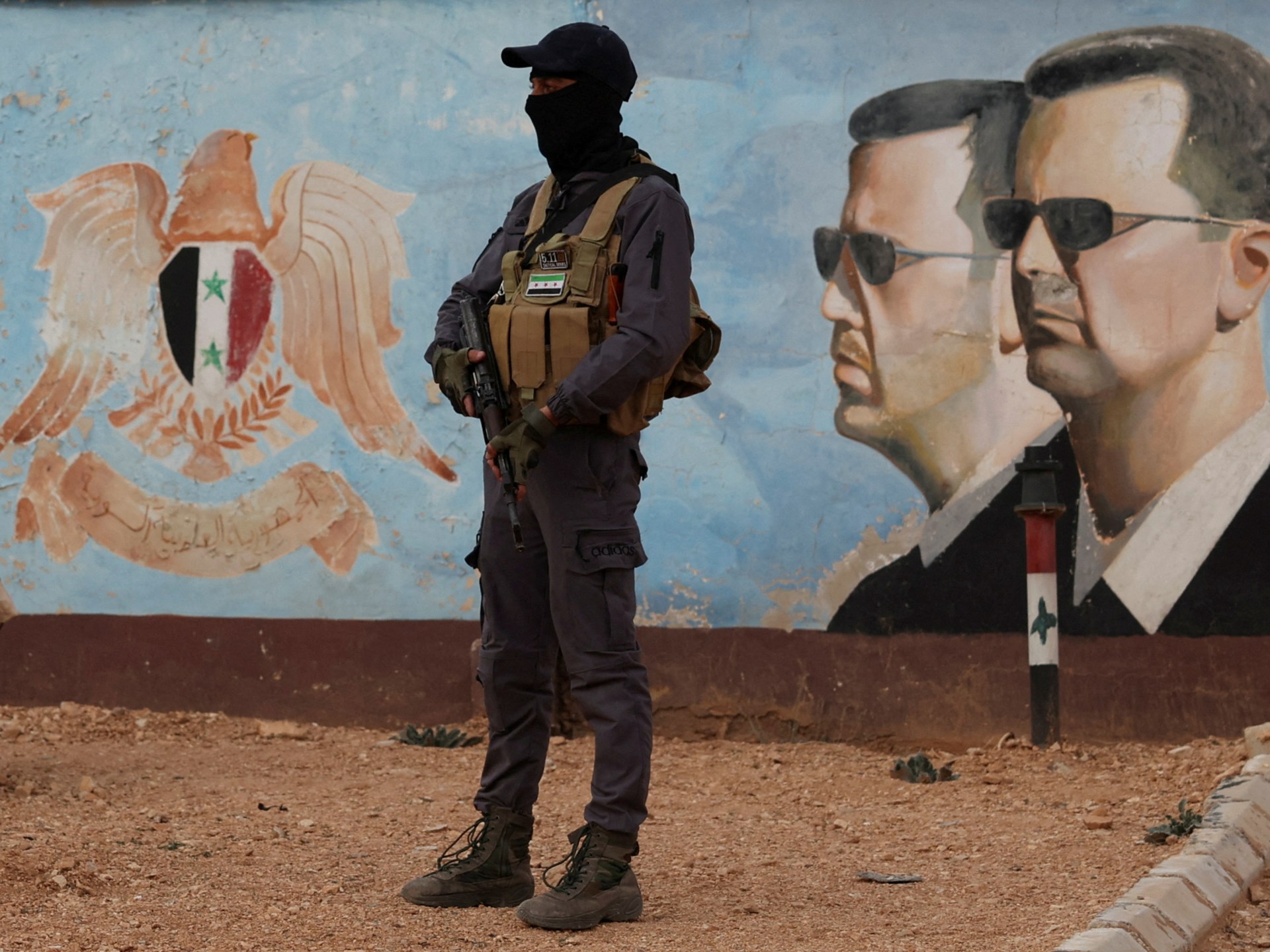 Syria detains former general over alleged protest crackdowns