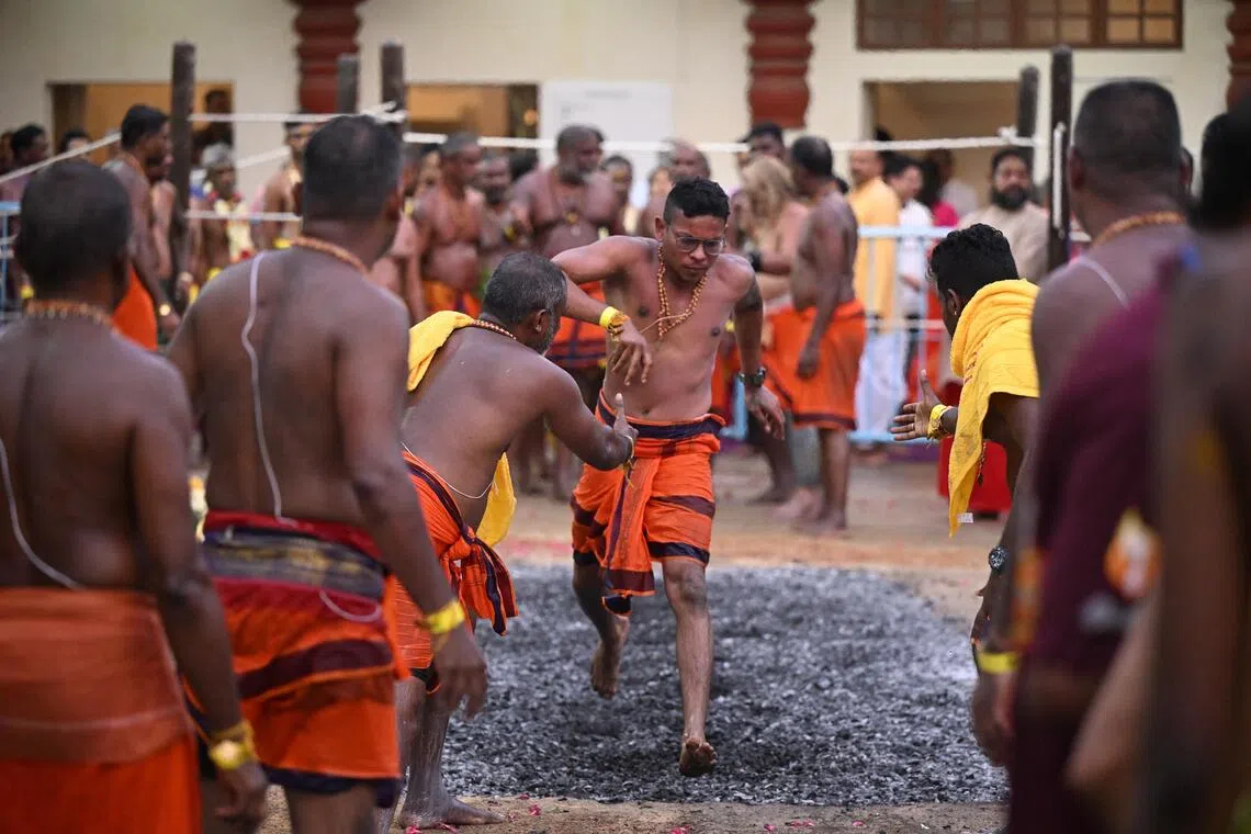 Hindu fire-walking festival expands reach with YouTube and Facebook livestreams