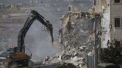 Israel demolishes Palestinian buildings in Hebron after soldiers killed