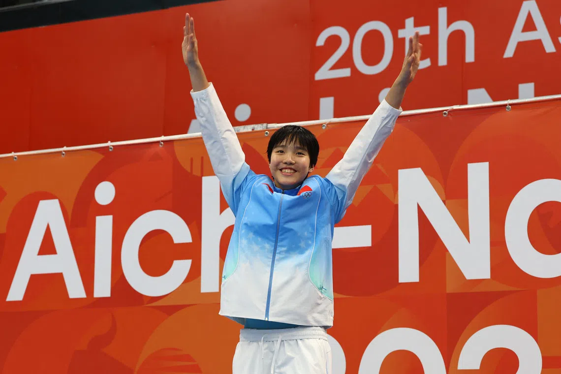 Young swimming champion Yu Zidi finds media spotlight tougher than pool competition
