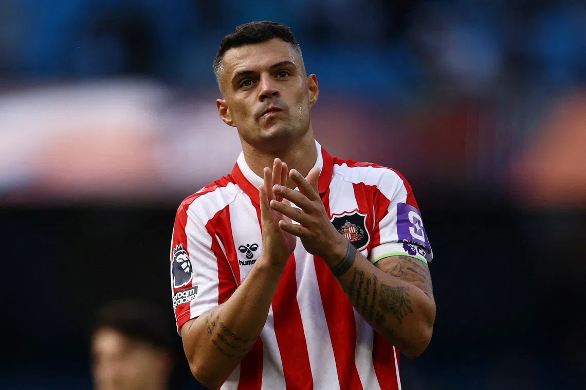 Switzerland captain Xhaka banned from camp over forged vaccine papers