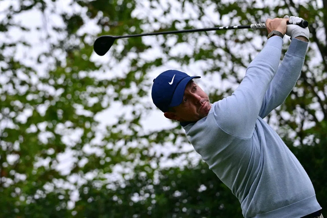 McIlroy surges at PGA Championship as Reed withdraws