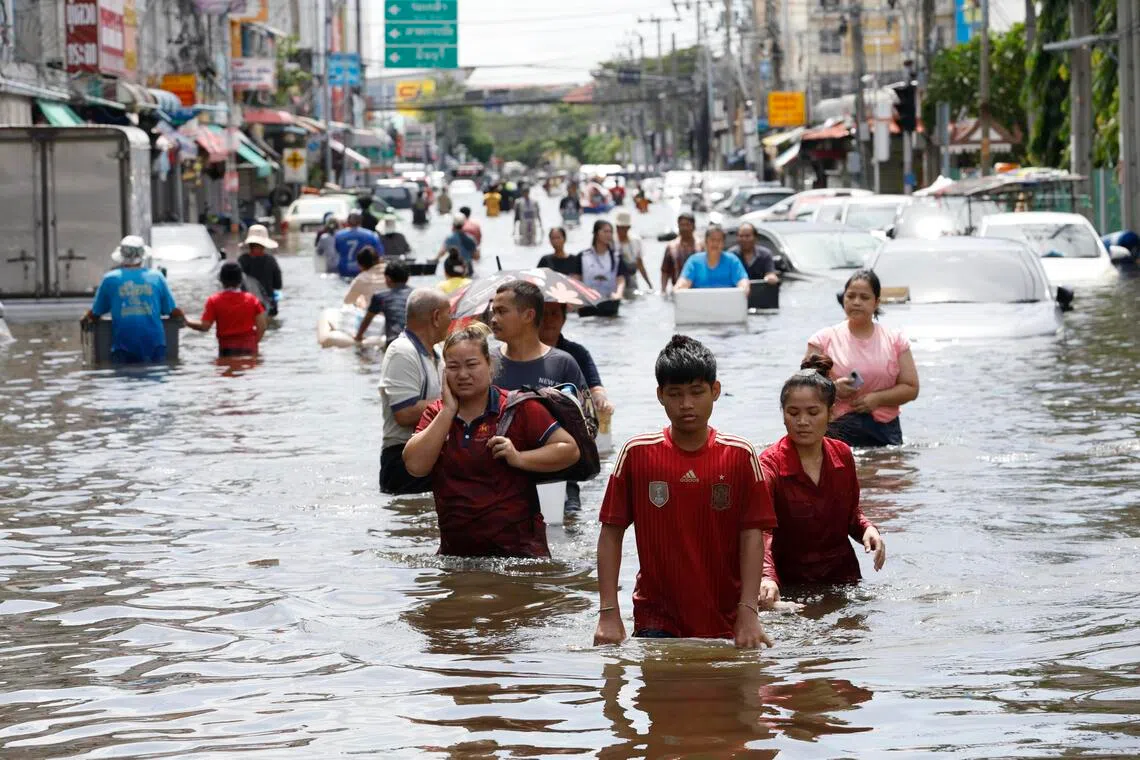 Bangkok braces for heavy rainfall as global finance leaders arrive