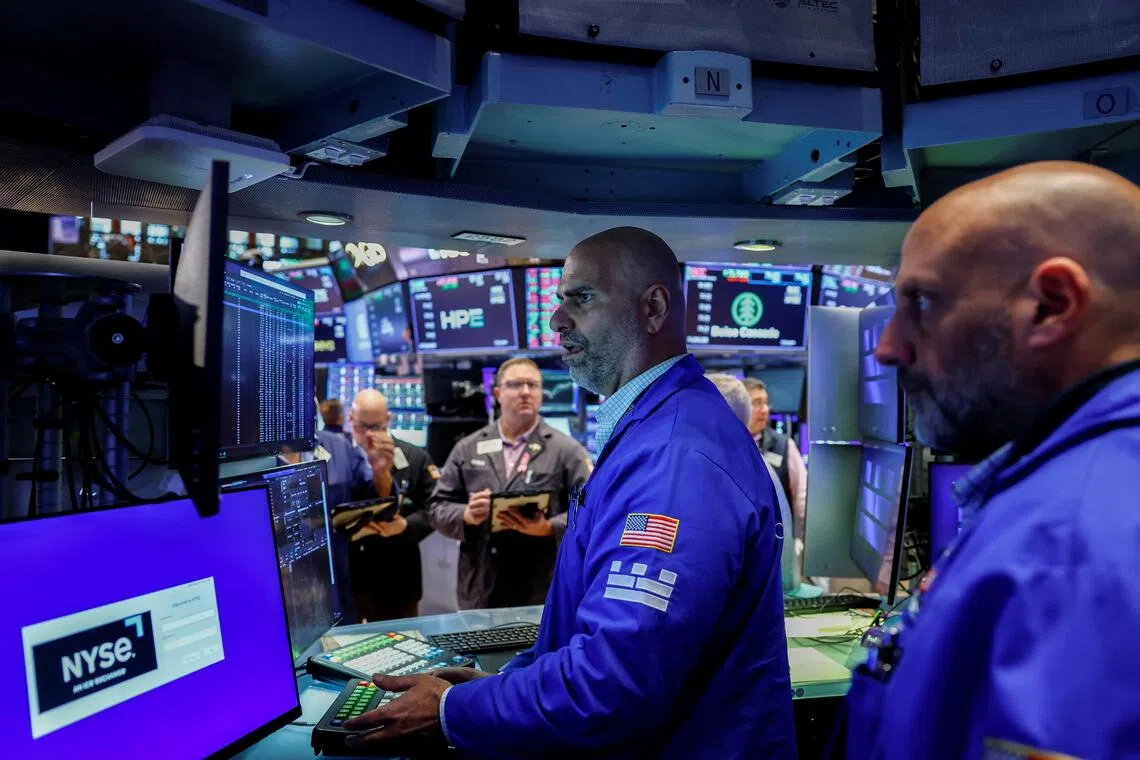 Nasdaq hits record high as artificial intelligence stocks surge