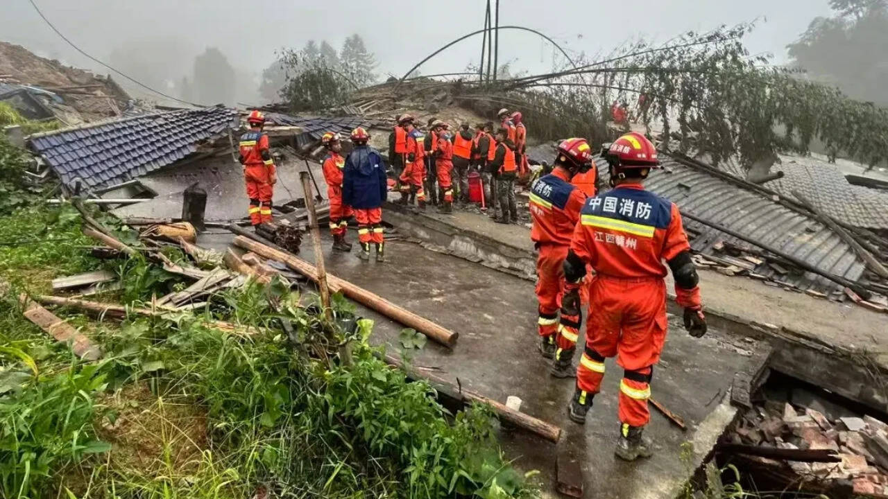 China mudslide death toll climbs to two as search continues