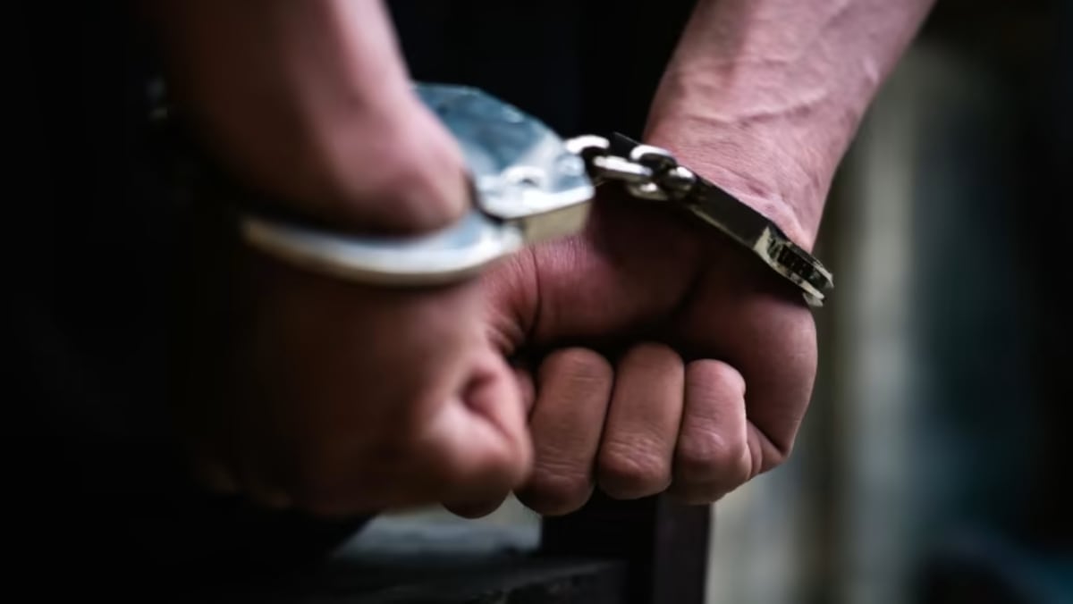 Two men arrested over suspected in-flight bank card thefts