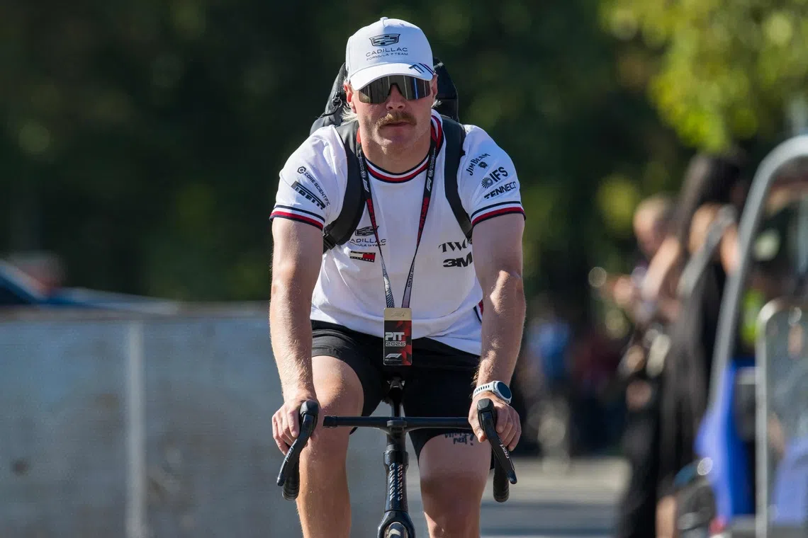 F1 veteran Bottas cycles 350km from Malaysia to Singapore GP