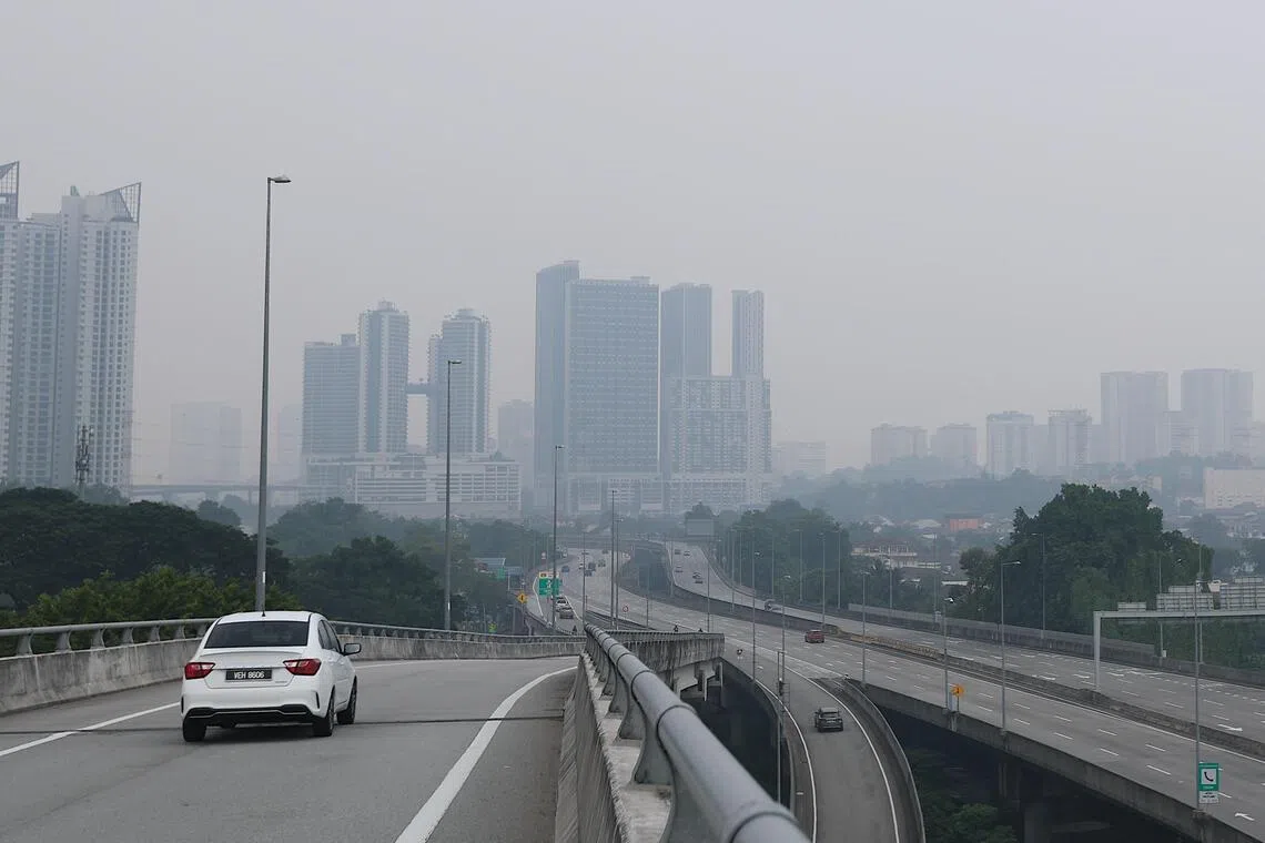 Malaysia to review aid after weather, haze drive up power bills
