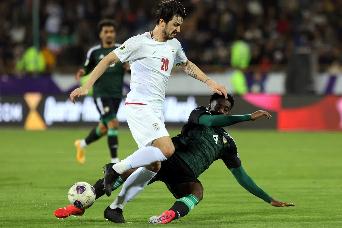 Iran striker Azmoun says no regrets over World Cup snub
