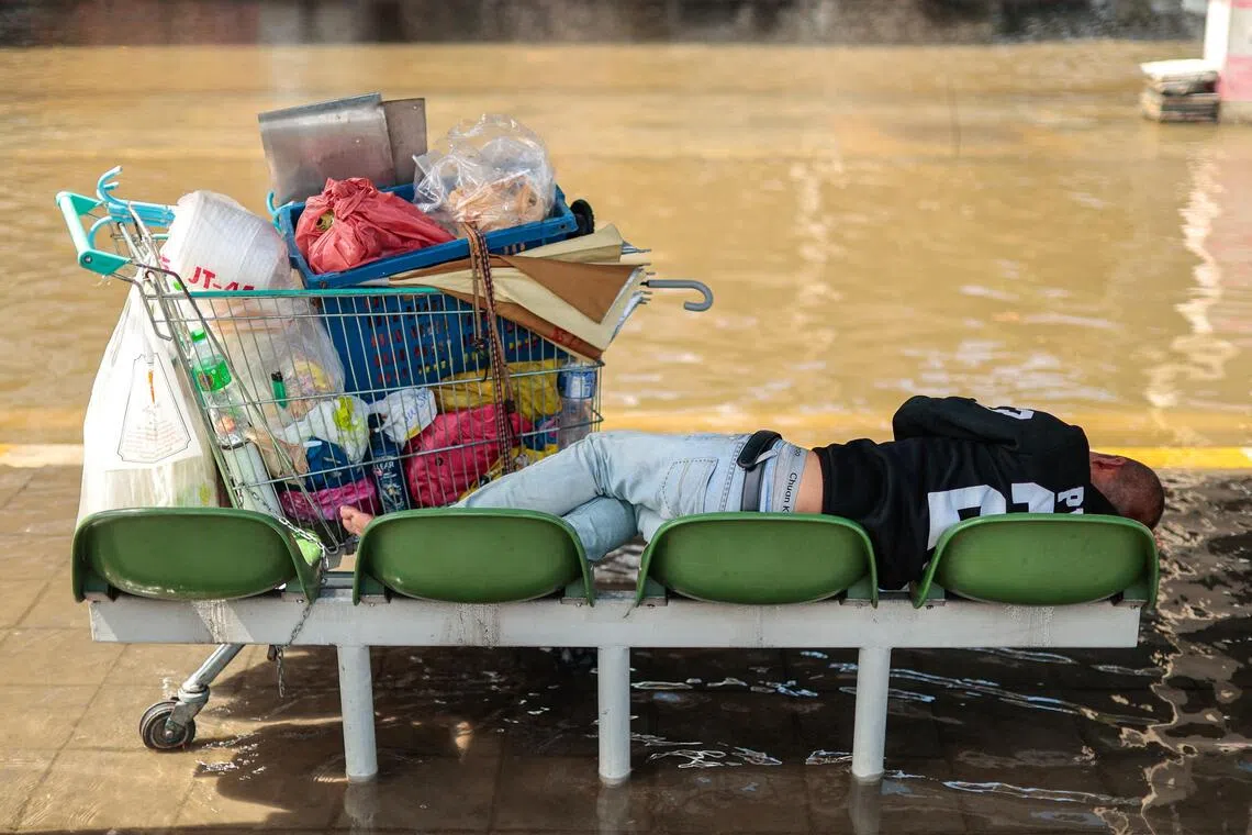 Bangkok floods deepen financial strain for low-income workers