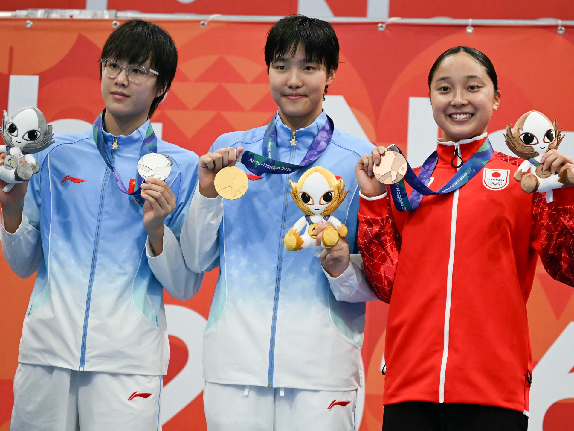 Chinese teen Yu Zidi wins third gold, smashes Asian Games swimming record
