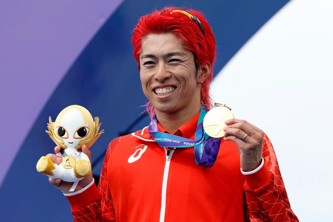 Japanese triathlete Hojo claims opening gold at Asian Games
