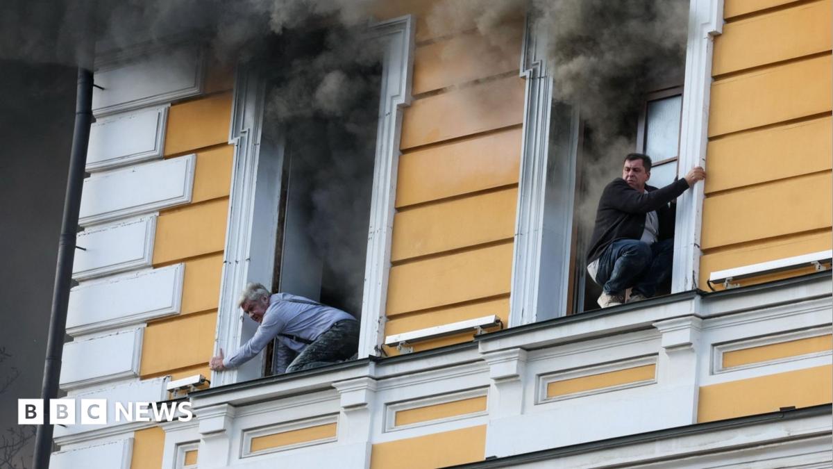 Residents evacuate after Russian drone strikes historic Kyiv science building