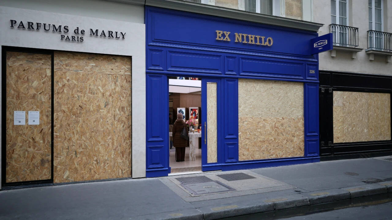Paris businesses fortify against fresh unrest as France deploys massive police presence