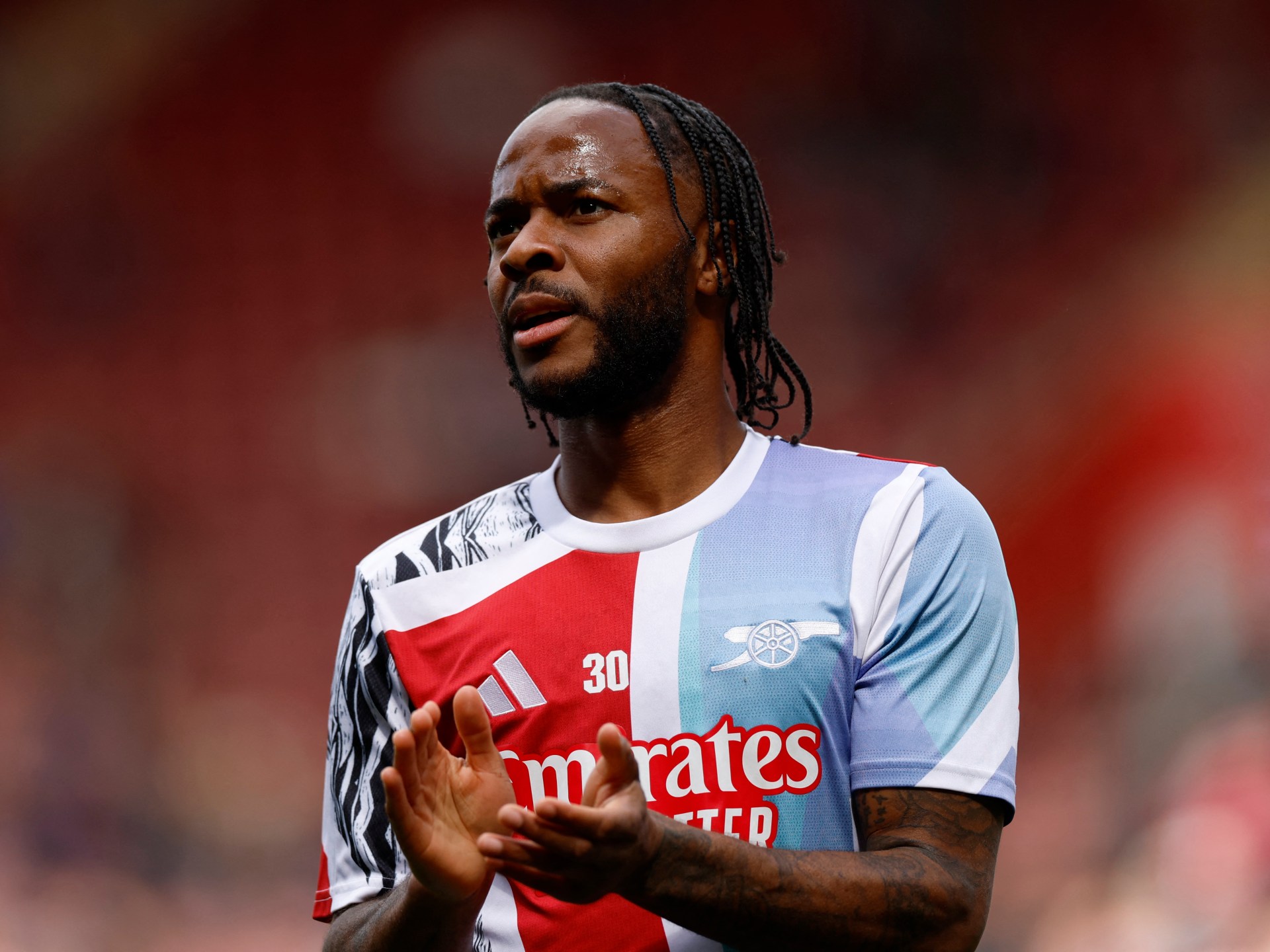 England footballer Sterling faces dangerous driving charge after collision