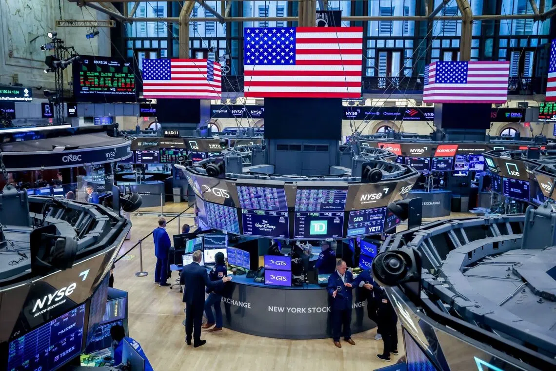 Nasdaq hits record high as AI sentiment revives, bond yields ease