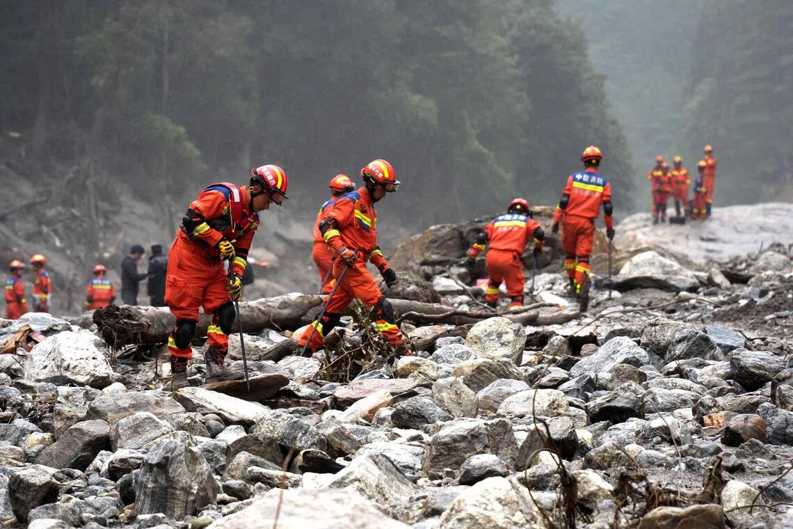 Chinese rescuers intensify search at Tibet mudslide as flooding risk subsides