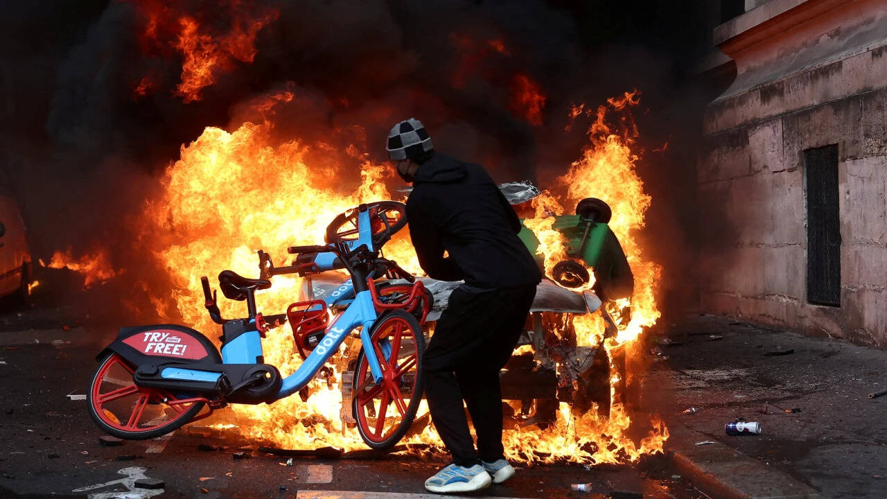 France imposes partial curfews as unrest spreads; emergency measures considered