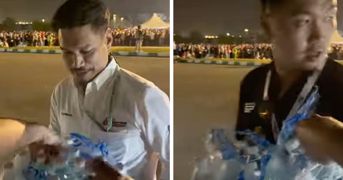 Sepang F1 Circuit Chief Personally Assists Departing Fans with Water