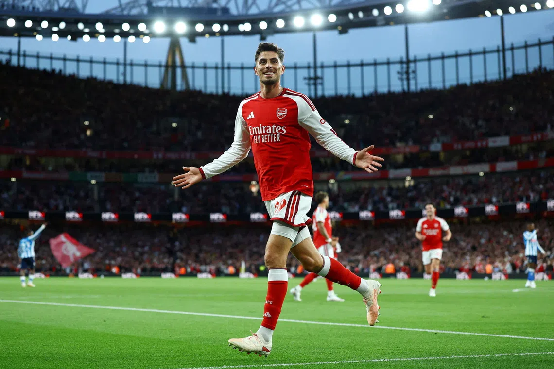Arsenal launches title defence with commanding win over Coventry