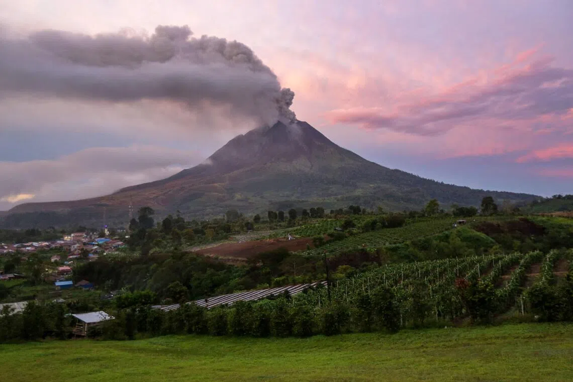 Sinabung eruption forces flight suspensions, mass evacuations in Indonesia