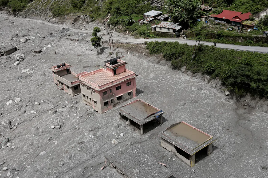 Nepal valley reduced to wasteland as rescuers search for trapped workers