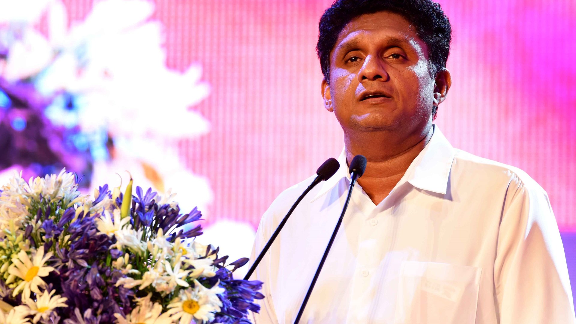 Buddhist monastic robes deserve respect, says Sajith