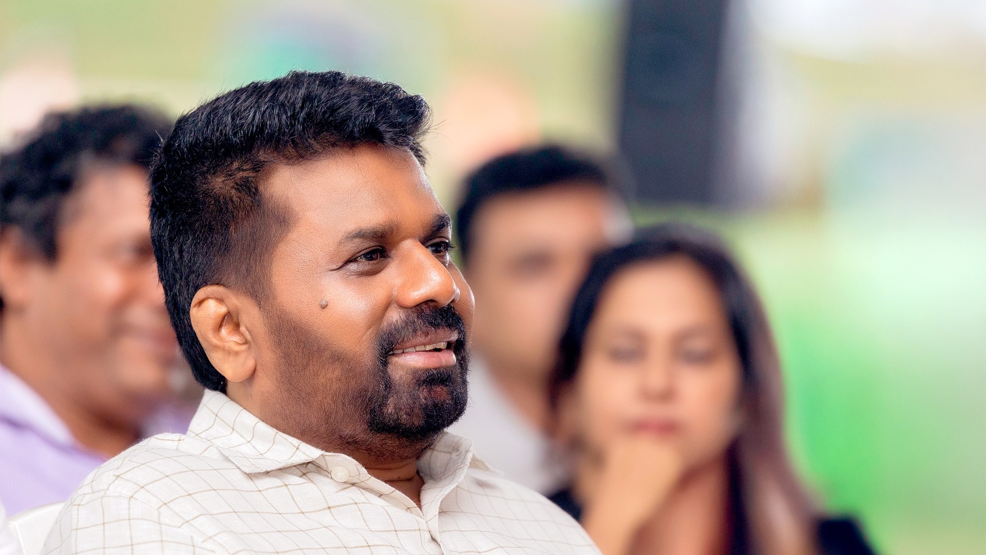 President says arrested businessman linked to politician in arms probe